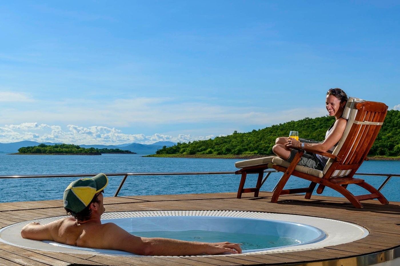 Private deck jacuzzi overlooking the lake aboard MV Matusadona.